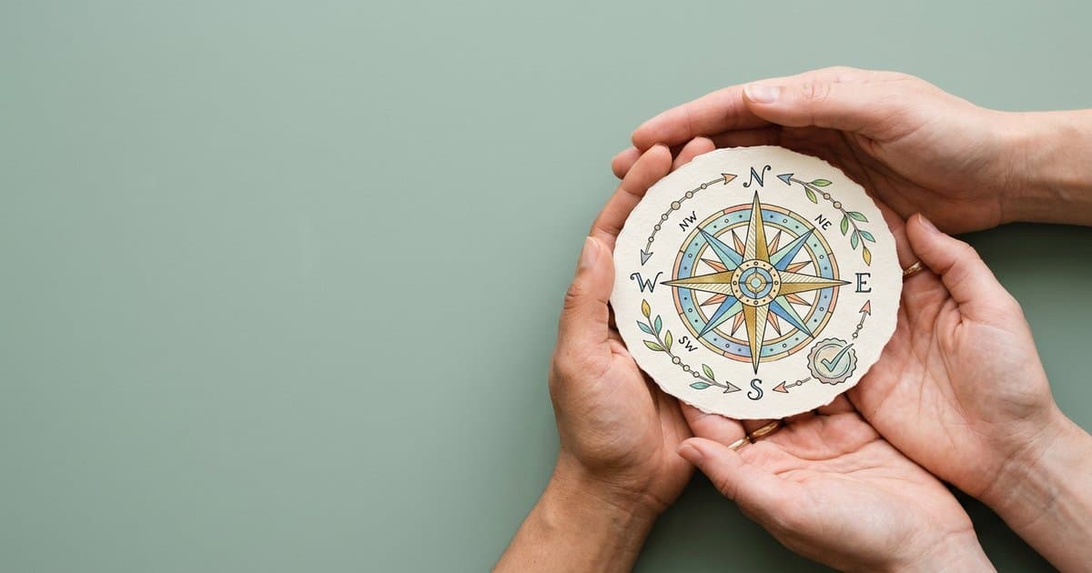 Hands holding a watercolour compass and quality seal, symbolising clear RRN training standards in UK care settings